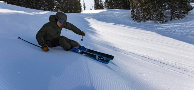 Skier on a snowy ski slope.