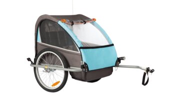 Child bike trailer with yellow safety flag.