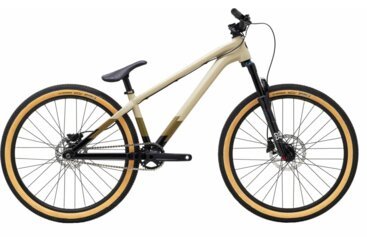 A mountain bike with tan tires.