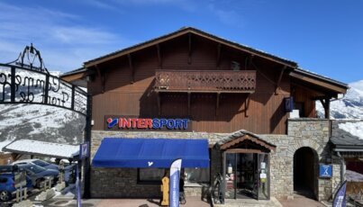 Intersport store in a wooden building in the mountains.