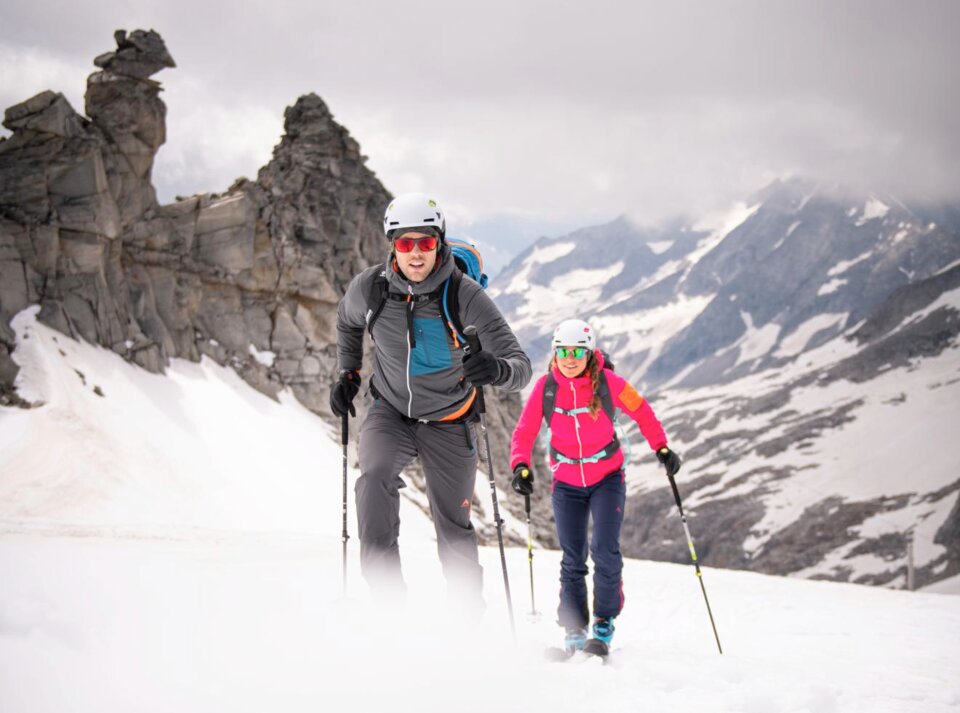 Two ski tourers test their ski touring equipment on a ski tour