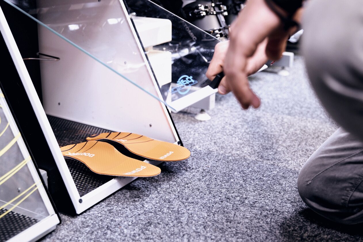 Orange insoles inside an apparatus